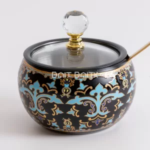 "Black and turquoise luxury sugar jar with golden floral patterns, crystal knob, and gold spoon — elegant oriental-style jar from Bait Baitk."