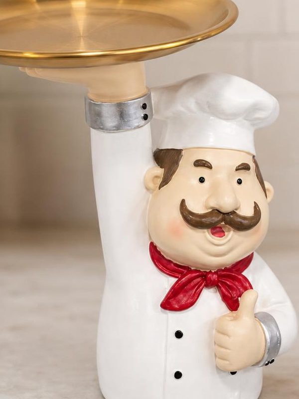 sk 5203 chef golden plate ai detail SK-5203 chef figurine close-up detail of golden plate and red scarf