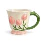 Pink tulip ceramic mug with green handle