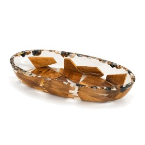 Oval wood and resin nuts dish on white background