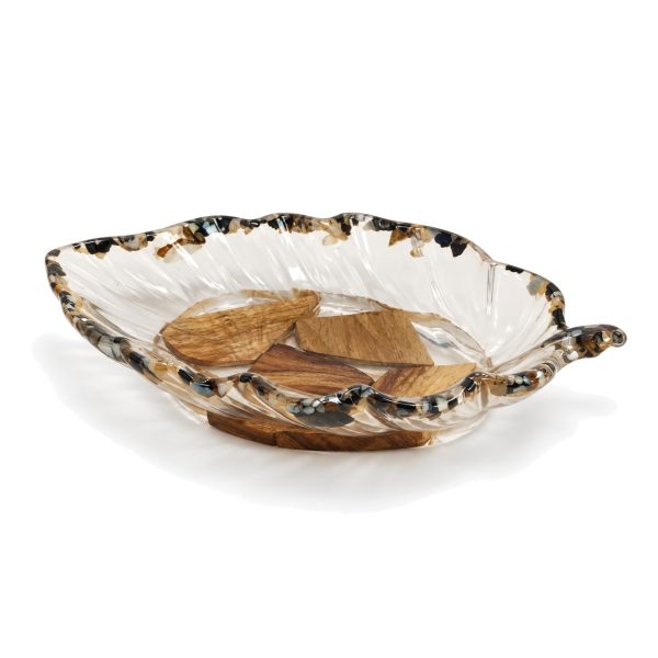 Leaf wood and resin nuts dish on white background