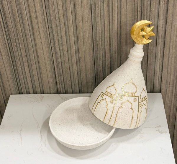 Stone-look date server with tagine lid open showing the dish Stone-look date server with tagine lid open showing the dish